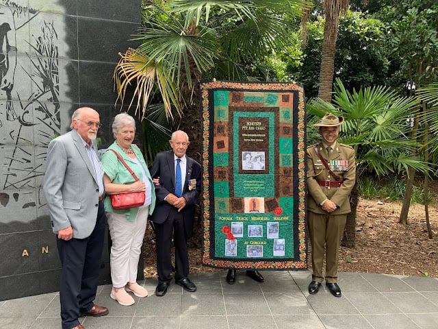 Presenting a quilt to a Digger of Kokoda….